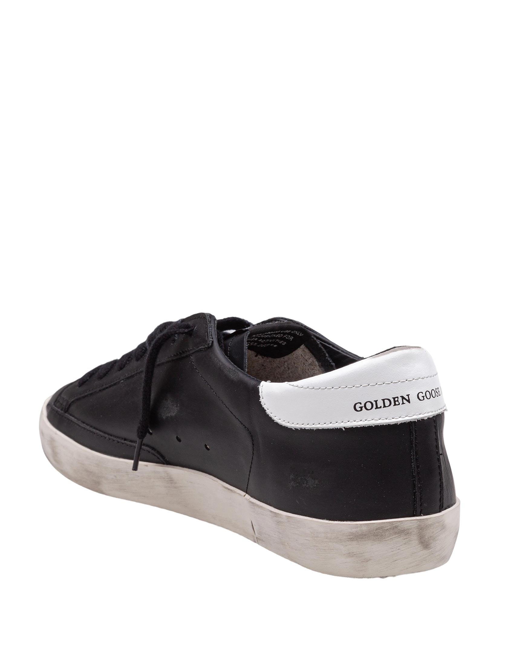 GOLDEN GOOSE SNEAKERS SUPER STAR IN PELLE COLORE NERO E BIANCO