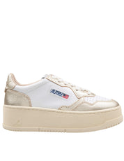 AUTRY LOW-TOP PLATFORM LEATHER SNEAKERS IN WHITE AND GOLD