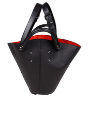MAISON MARGIELA SMALL DRESS-AGE LEATHER BUCKET BAG IN BLACK AND RED