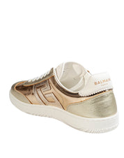 BALMAIN SNEAKERS SWAN IN PELLE LAMINATA COLORE ORO