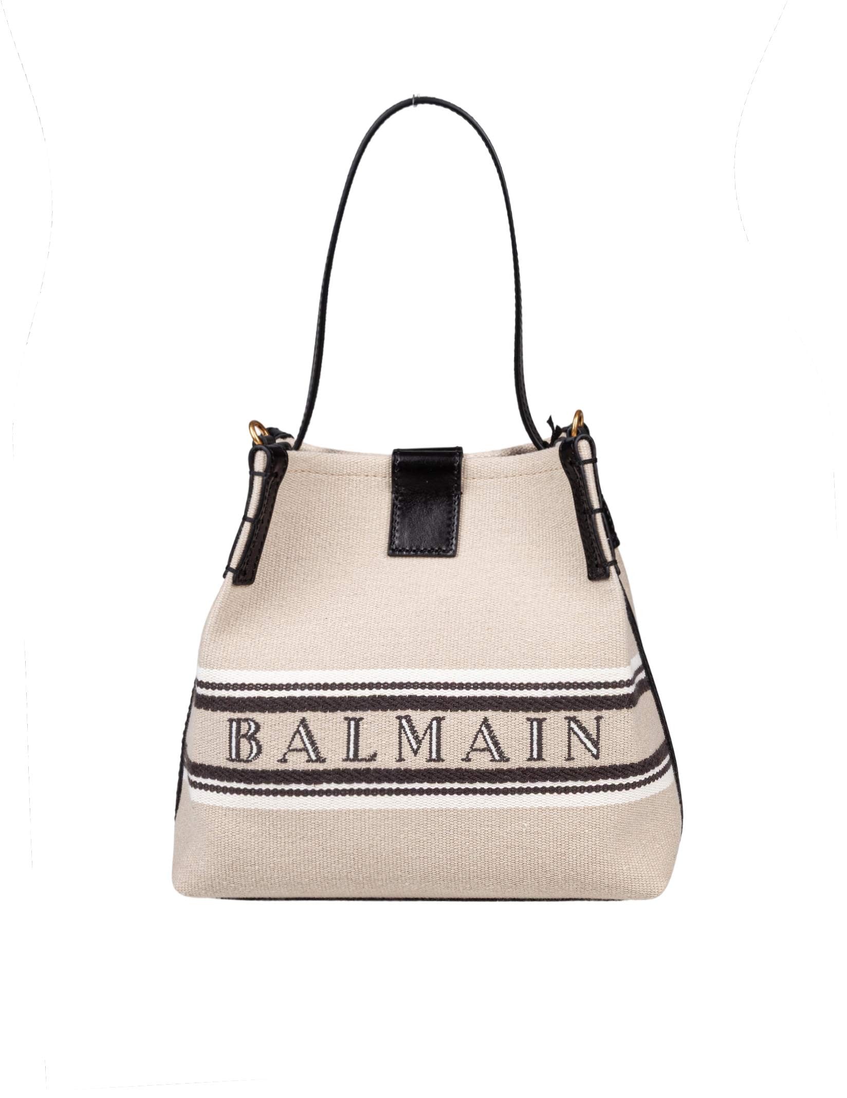 BALMAIN RELEASE CANVAS AND LEATHER BUCKET BAG WITH LOGO