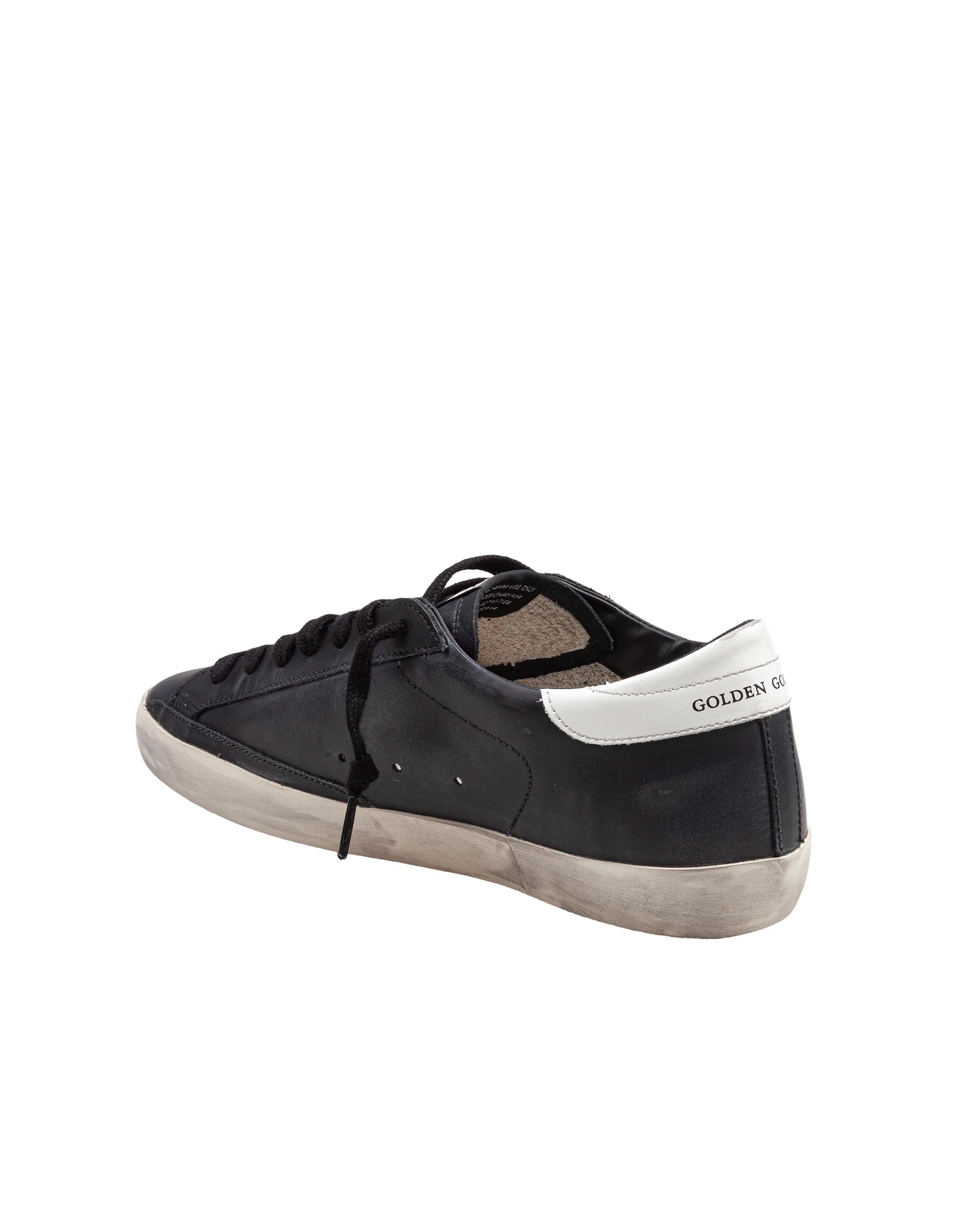 GOLDEN GOOSE SUPERSTAR SNEAKERS IN BLACK AND WHITE LEATHER